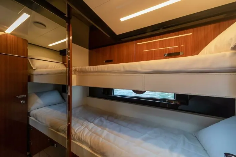 2021 Riva 56 Rivale &ldquo;grey&rdquo; Yacht Photos Pics Luxurious 2021 Riva 56 yacht interior with elegant wooden bunk beds.