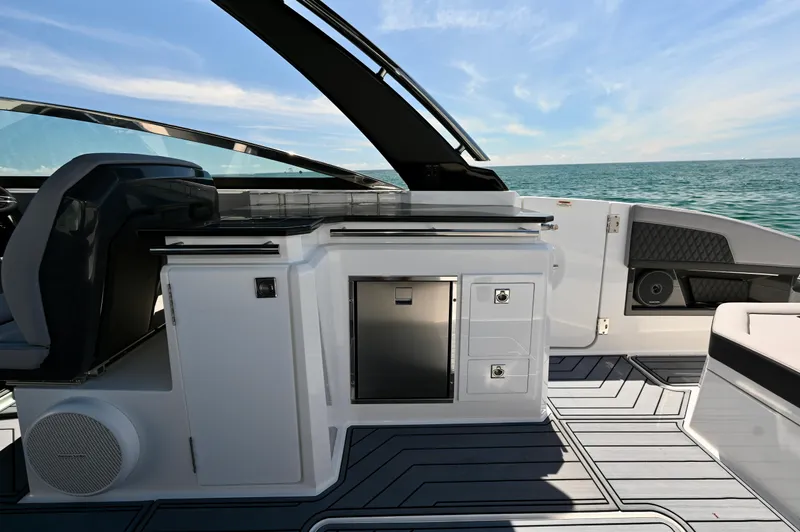  Yacht Photos Pics 2025 Cobalt R33 Outboard boat interior with sleek design and modern amenities.