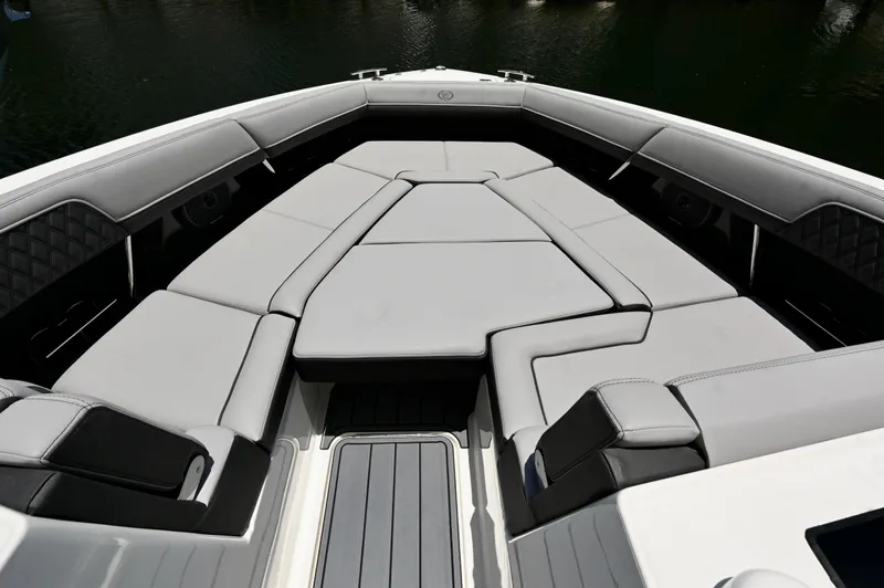 Yacht Photos Pics 2025 Cobalt R33 Outboard boat interior with luxurious gray seating and sleek design.