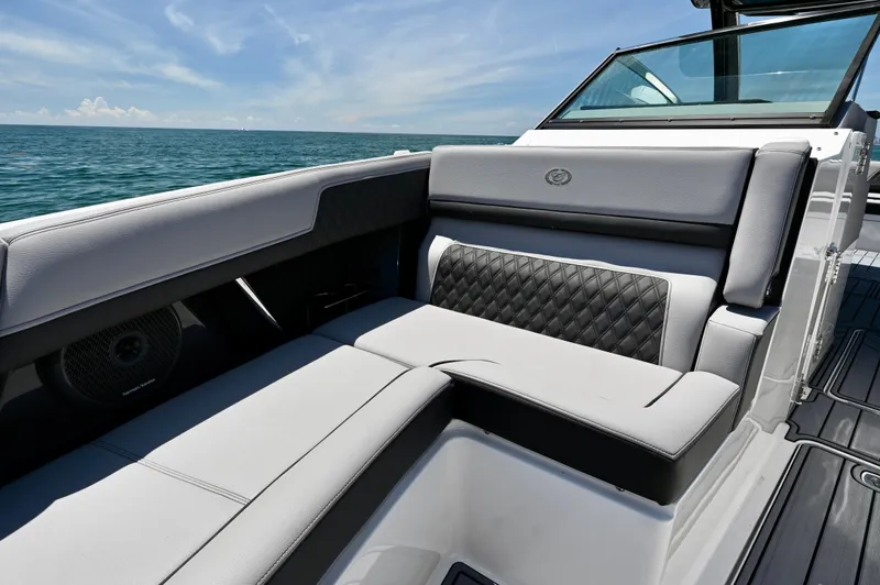  Yacht Photos Pics Luxurious seating on 2025 Cobalt R33 Outboard boat, featuring elegant design and ocean view.