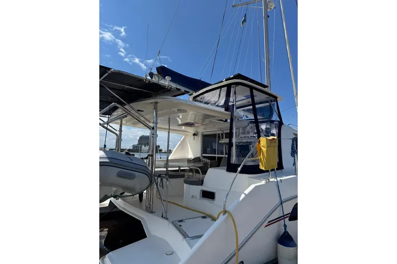  Yacht Photos Pics 2012 Leopard 39 Owner's Version catamaran docked under clear blue sky.