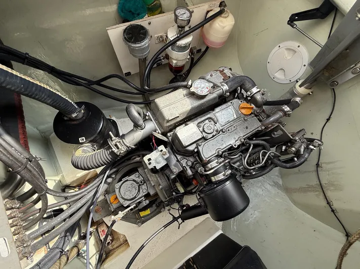  Yacht Photos Pics Engine compartment of a 2012 Leopard 39 Owner's Version catamaran, showcasing detailed components.