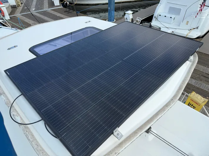  Yacht Photos Pics Solar panel on 2012 Leopard 39 Owner's Version catamaran at dock.