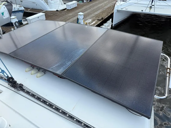  Yacht Photos Pics Solar panels on a 2012 Leopard 39 Owner's Version catamaran at a marina.