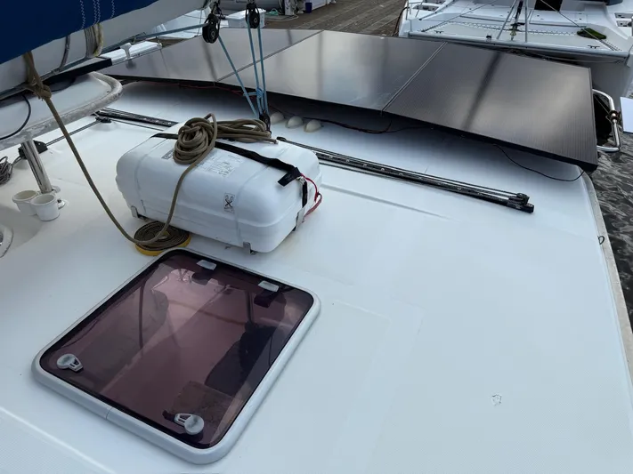  Yacht Photos Pics 2012 Leopard 39 Owner's Version yacht deck with solar panels and hatch.