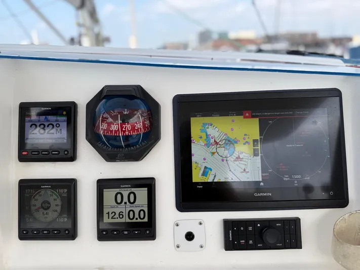  Yacht Photos Pics Control panel of a 2012 Leopard 39 Owner's Version yacht with navigation instruments.