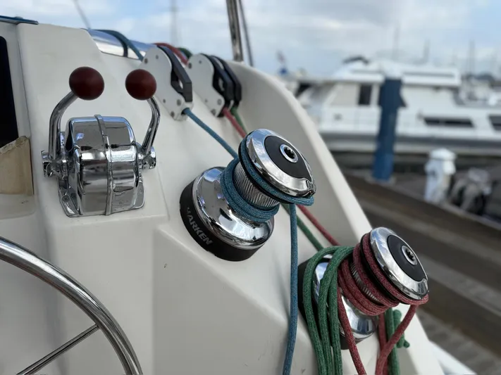  Yacht Photos Pics Sailboat controls and winches on a 2012 Leopard 39 Owner's Version yacht.