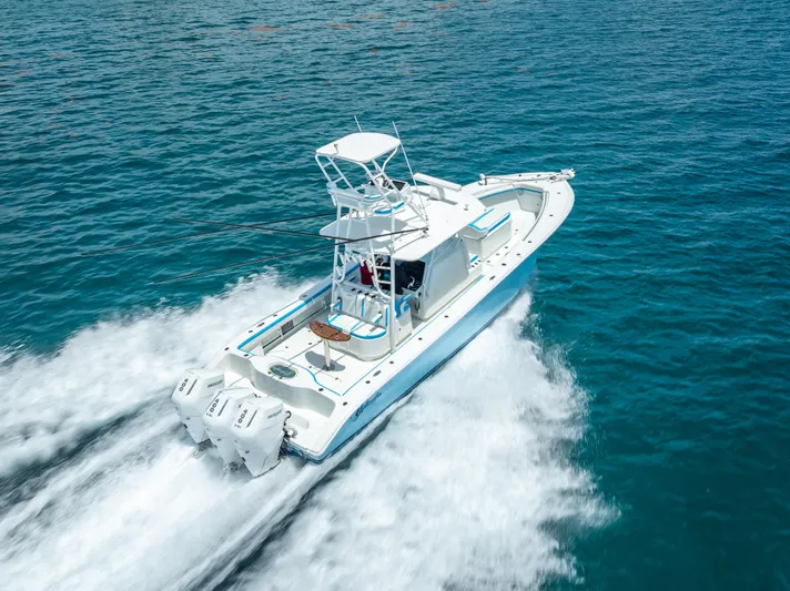  Yacht Photos Pics 2016 Yellowfin 39 Offshore boat cruising on open blue water.