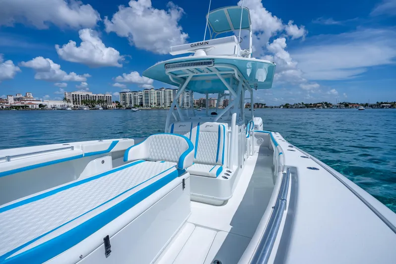  Yacht Photos Pics 2016 Yellowfin 39 Offshore boat on clear blue water under a sunny sky.