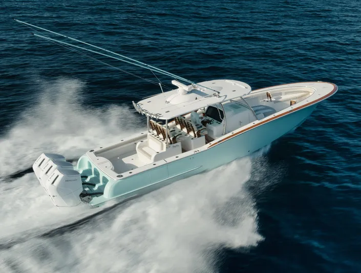  Yacht Photos Pics 2025 Mag Bay 43 CC center console boat cruising on open water.