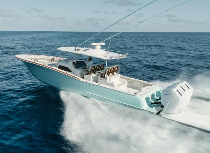  Yacht Photos Pics 2025 Mag Bay 43 CC boat cruising on open ocean.