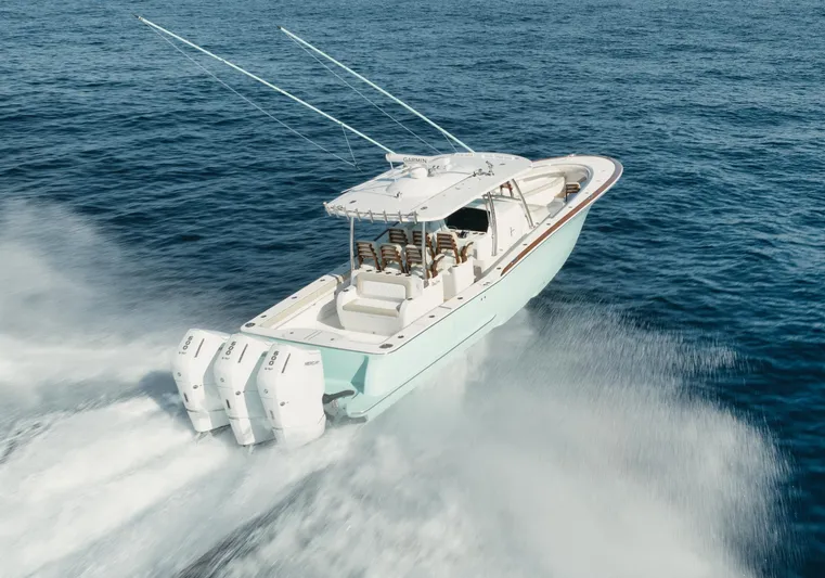  Yacht Photos Pics 2025 Mag Bay 43 CC boat cruising on open water.