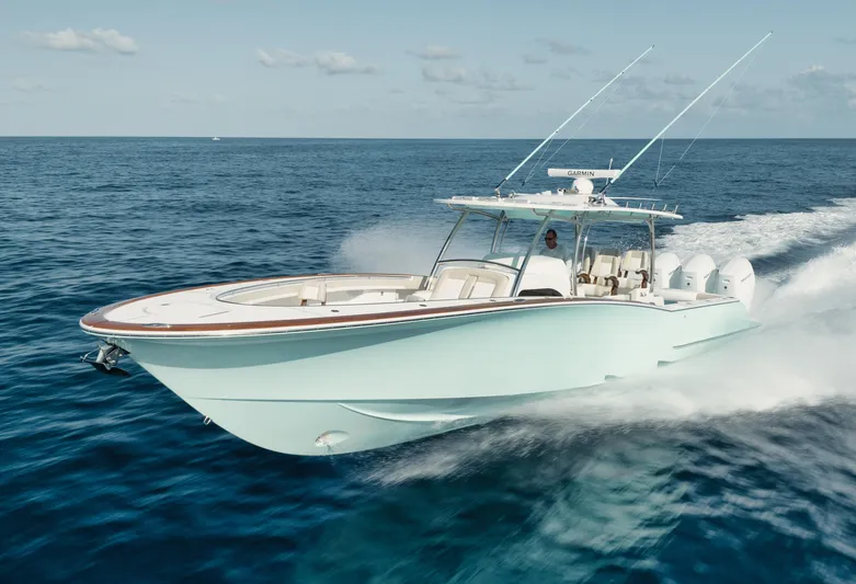  Yacht Photos Pics 2025 Mag Bay 43 CC boat cruising on open water.