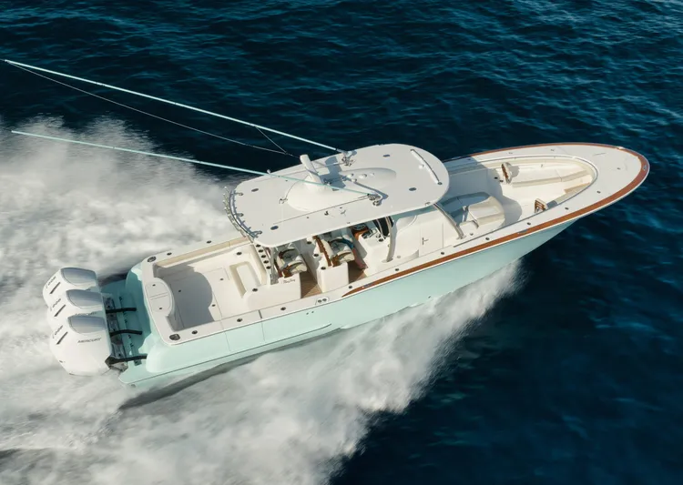  Yacht Photos Pics 2025 Mag Bay 43 CC boat cruising on open water.