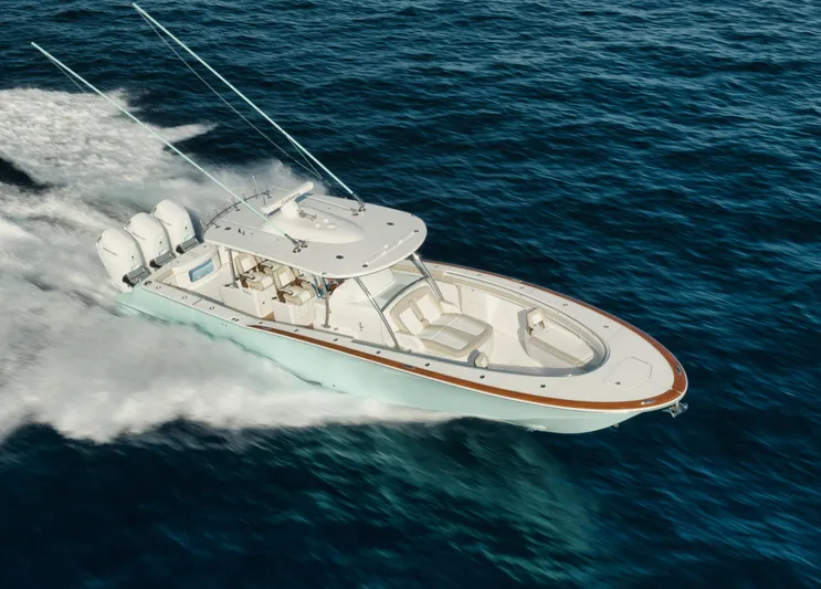  Yacht Photos Pics 2025 Mag Bay 43 CC boat cruising on open water.