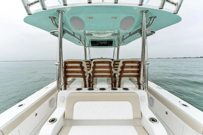  Yacht Photos Pics 2025 Mag Bay 43 CC center console boat with seating and ocean view.