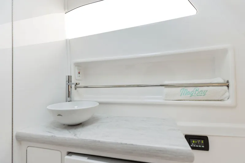  Yacht Photos Pics 2025 Mag Bay 43 CC boat interior with modern sink and countertop.