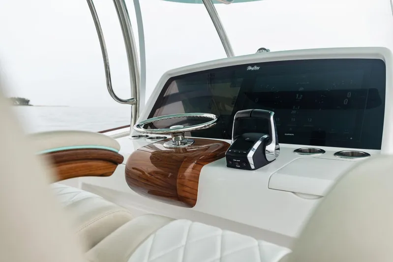  Yacht Photos Pics Helm of 2025 Mag Bay 43 CC boat with modern controls and luxurious design.