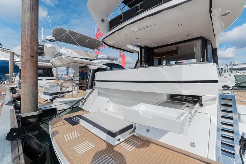 Allouise Yacht Photos Pics 2022 Galeon 460 Fly yacht docked, showcasing sleek design and spacious deck.