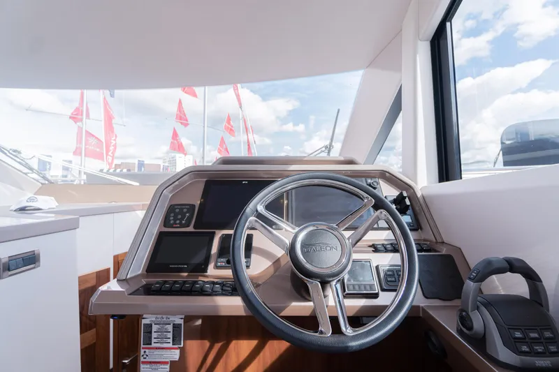 Allouise Yacht Photos Pics Helm of 2022 Galeon 460 Fly yacht with modern controls and steering wheel.