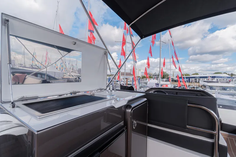 Allouise Yacht Photos Pics Galeon 460 Fly 2022 yacht deck with grill and marina view.