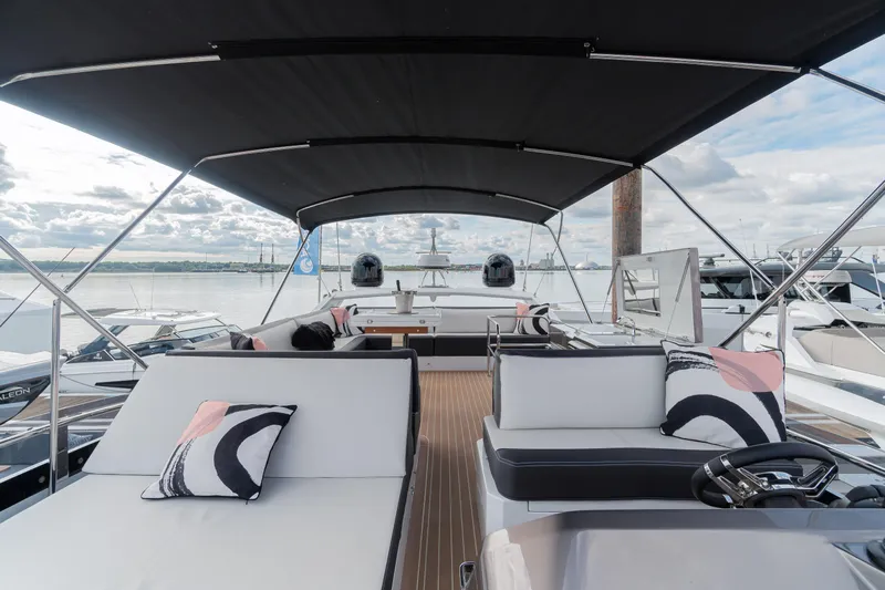 Allouise Yacht Photos Pics 2022 Galeon 460 Fly yacht deck with cushioned seating and canopy.