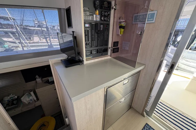 Daylight Yacht Photos Pics Interior of 2018 Leopard 40 catamaran with control panel and modern amenities.
