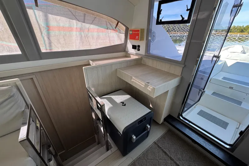 Daylight Yacht Photos Pics Interior of 2018 Leopard 40 yacht with modern design and outdoor access.