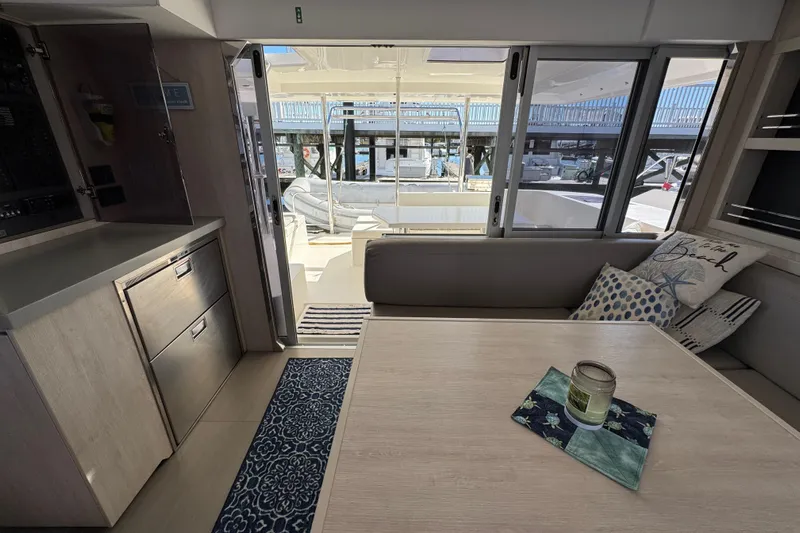 Daylight Yacht Photos Pics Interior of 2018 Leopard 40 catamaran with modern decor and outdoor view.