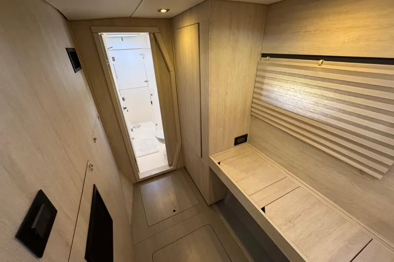 Daylight Yacht Photos Pics Interior of 2018 Leopard 40 yacht with modern wood finish and compact design.