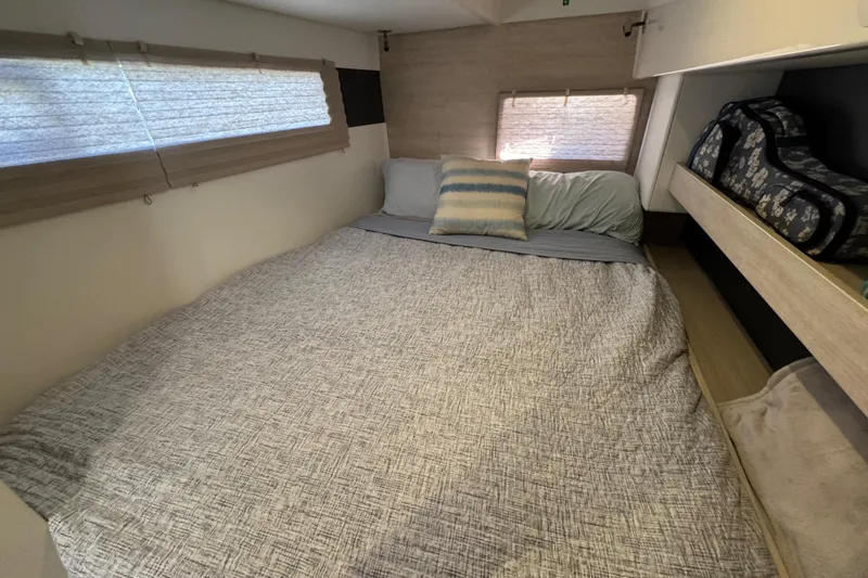 Daylight Yacht Photos Pics Cozy bedroom in 2018 Leopard 40 catamaran with soft bedding and natural light.