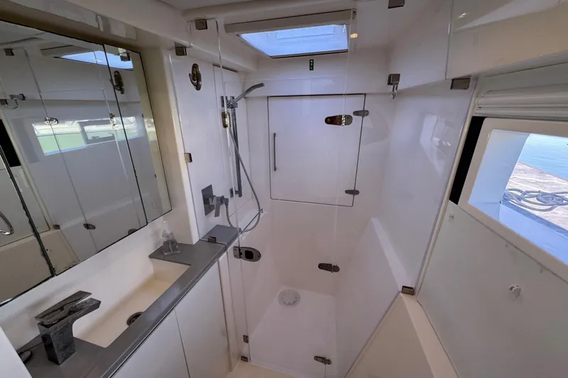 Daylight Yacht Photos Pics Modern bathroom in 2018 Leopard 40 yacht with shower and skylight.