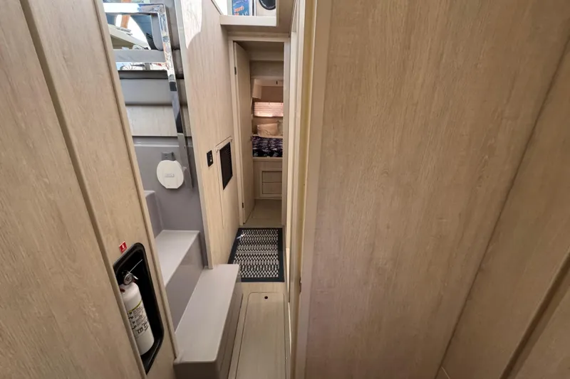 Daylight Yacht Photos Pics Interior of 2018 Leopard 40 yacht, featuring a narrow hallway and modern design.