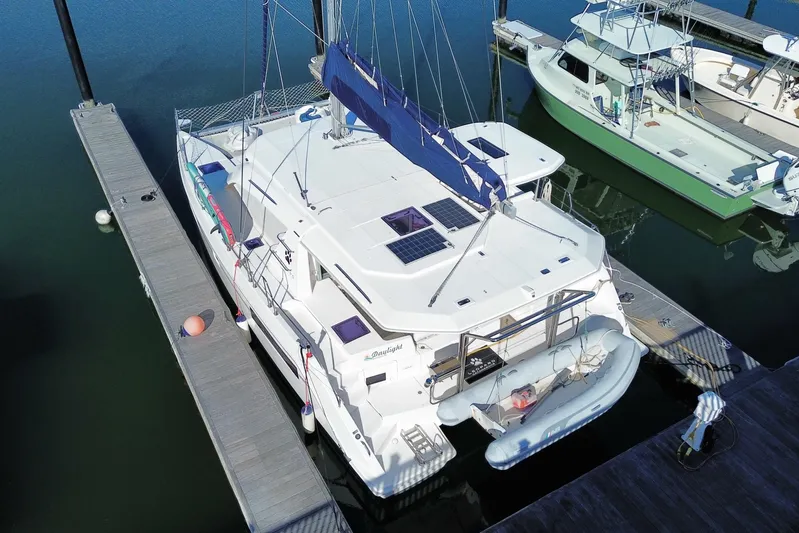 Daylight Yacht Photos Pics Aerial view of a 2018 Leopard 40 catamaran docked at a marina.