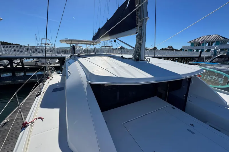 Daylight Yacht Photos Pics 2018 Leopard 40 catamaran docked at marina under clear blue sky.