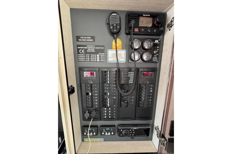 Daylight Yacht Photos Pics Electrical control panel of a 2018 Leopard 40 catamaran with various switches and gauges.