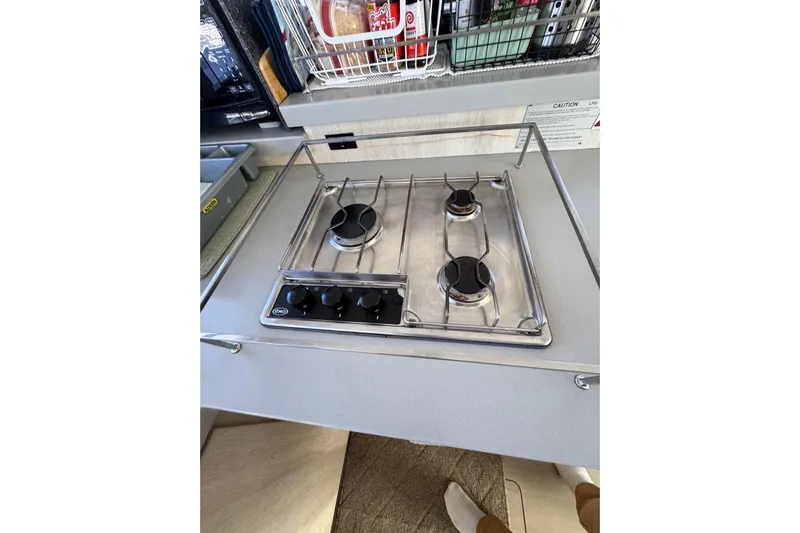 Daylight Yacht Photos Pics Stainless steel three-burner stove in 2018 Leopard 40 catamaran kitchen.