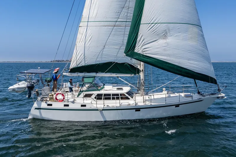Aesclepius Yacht Photos Pics Sailing yacht Bruce Roberts 49, 2006 model, cruising on open water with full sails.