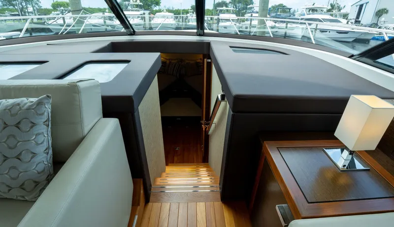 True North Yacht Photos Pics Interior view of 2017 Tiara Yachts F53 Flybridge, showcasing elegant design and luxurious furnishings.