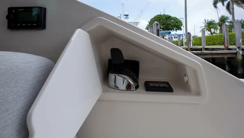 True North Yacht Photos Pics Control panel on 2017 Tiara Yachts F53 Flybridge, featuring joystick and buttons.