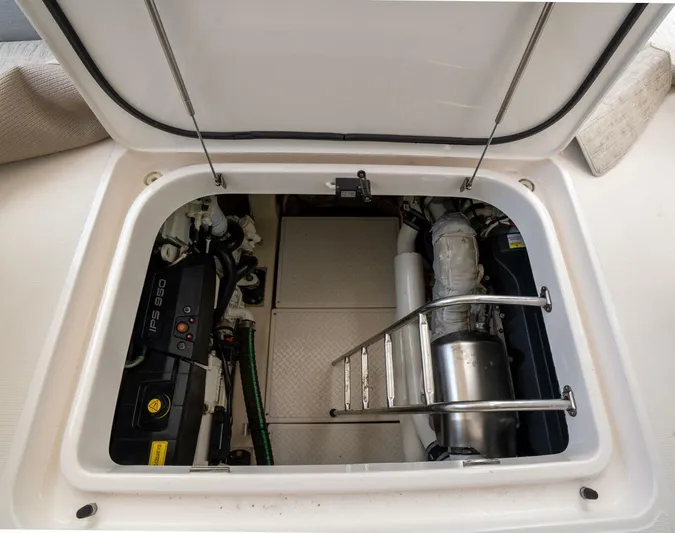 True North Yacht Photos Pics Engine compartment of 2017 Tiara Yachts F53 Flybridge, showcasing mechanical components.