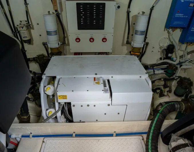 True North Yacht Photos Pics Engine room of 2017 Tiara Yachts F53 Flybridge with generator and control panel.