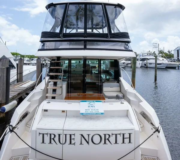 True North Yacht Photos Pics 2017 Tiara Yachts F53 Flybridge named "True North" docked at marina.