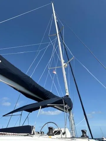 Ivana V Yacht Photos Pics 2012 Lagoon 450 sailboat mast and rigging against clear blue sky.