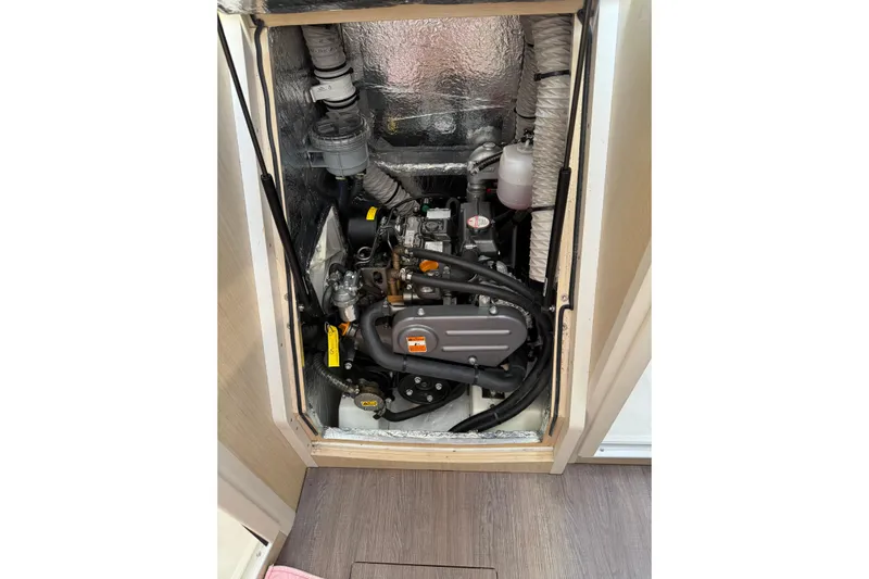 Kaifu Yacht Photos Pics Engine compartment of 2020 Beneteau Oceanis 30.1 sailboat, showcasing mechanical components.