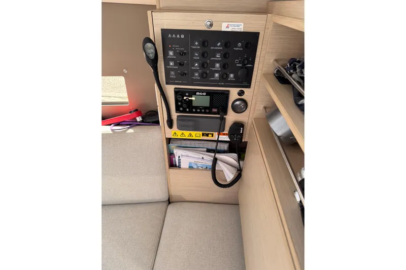 Kaifu Yacht Photos Pics Control panel inside 2020 Beneteau Oceanis 30.1 yacht, featuring navigation and communication equipment.