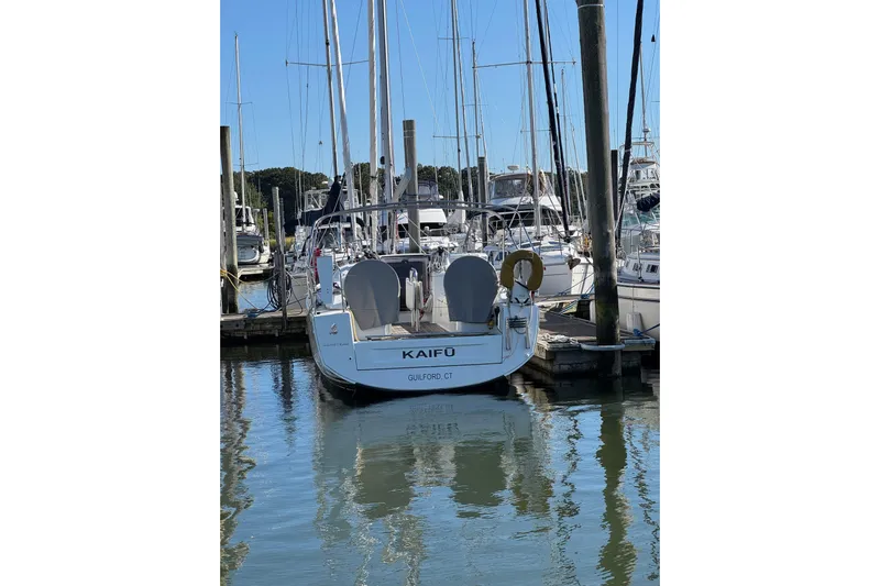 Kaifu Yacht Photos Pics Beneteau Oceanis 30.1 sailboat docked in a marina, 2020 model.