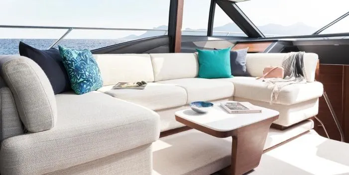  Yacht Photos Pics Luxurious interior of 2025 Princess S62 yacht with elegant seating and ocean view.