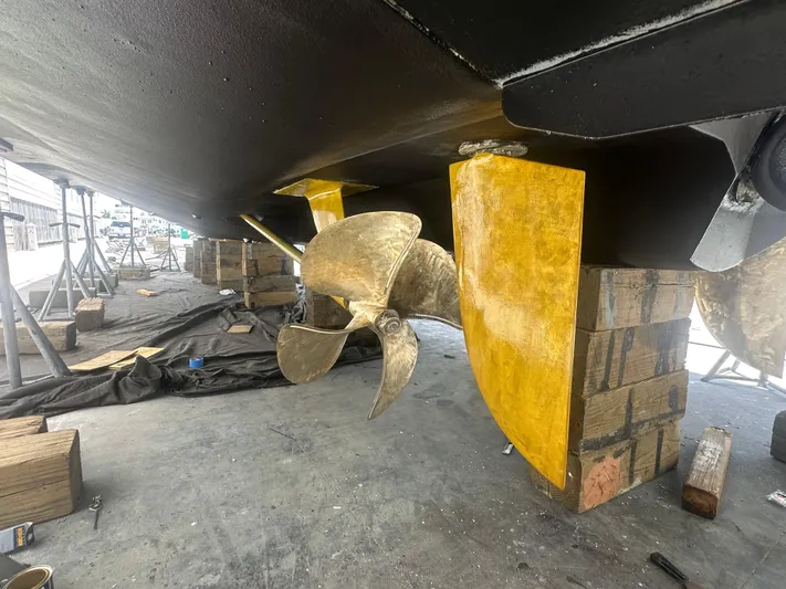  Yacht Photos Pics Propeller and rudder of 2015 Princess f56 yacht on dry dock.