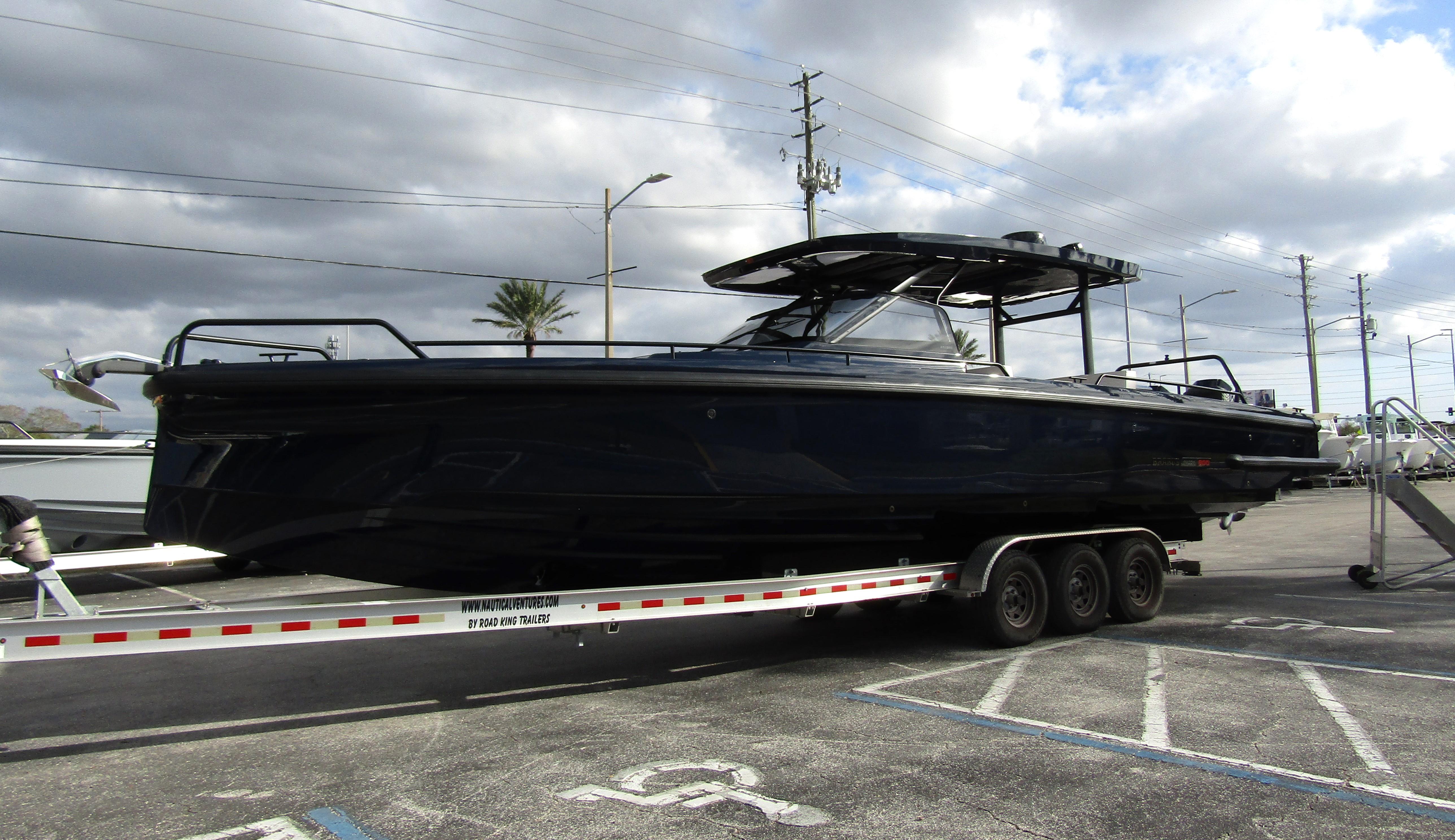2024 BRABUS Shadow 900 ST boat on trailer, parked outdoors under cloudy sky.